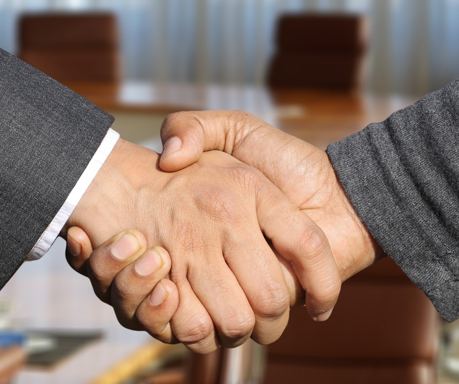 men shaking hands for agreement (by PlatoForms PDF form tool)